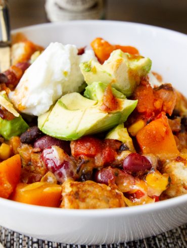 Instant Pot Spicy Vegetarian Chili in a bowl with spoon