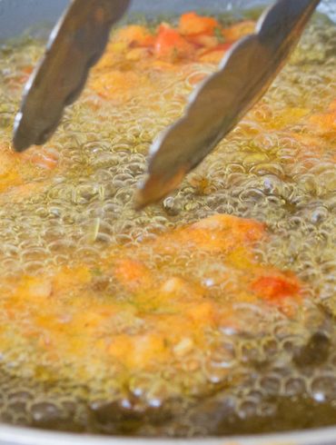 Pan frying tomato fritters